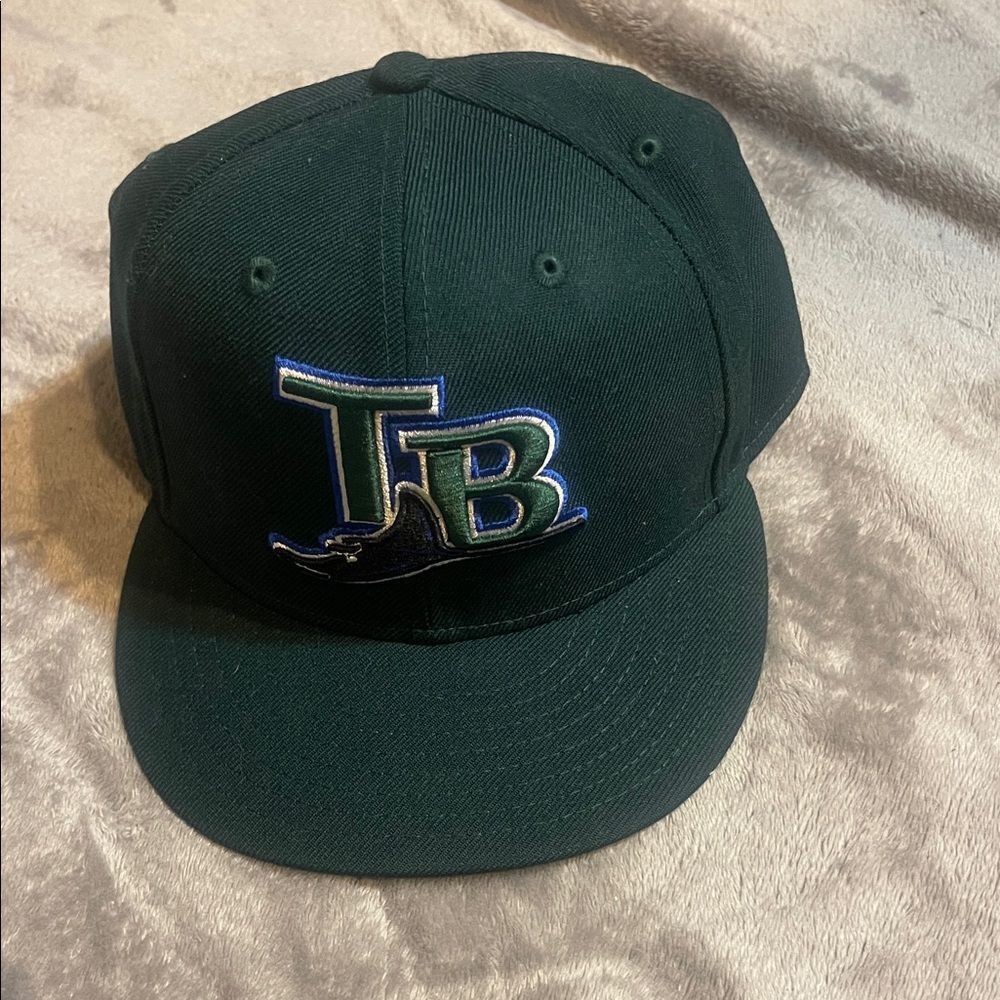 Dark Green TB Logo Cap 
Fitted size of 7 3/8